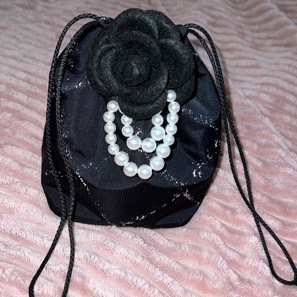 CHANEL Handbags - Chanel Travel Ligne Cosmetic Pouch black W/white and red interior, authentic EUC